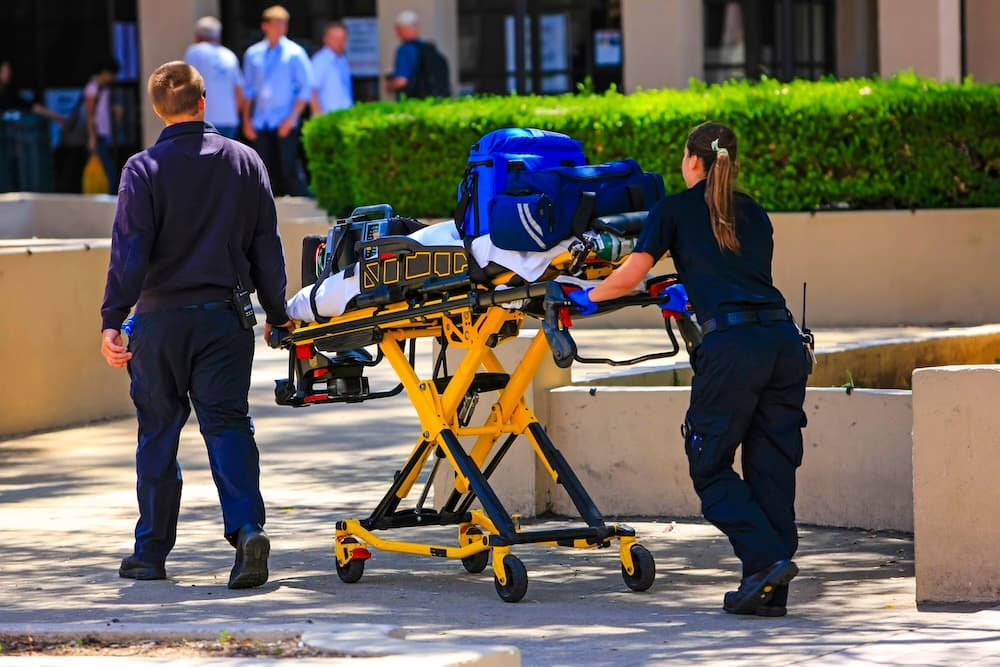 Paramedics Pushing A Gurny Paramedics Pushing A Gurny