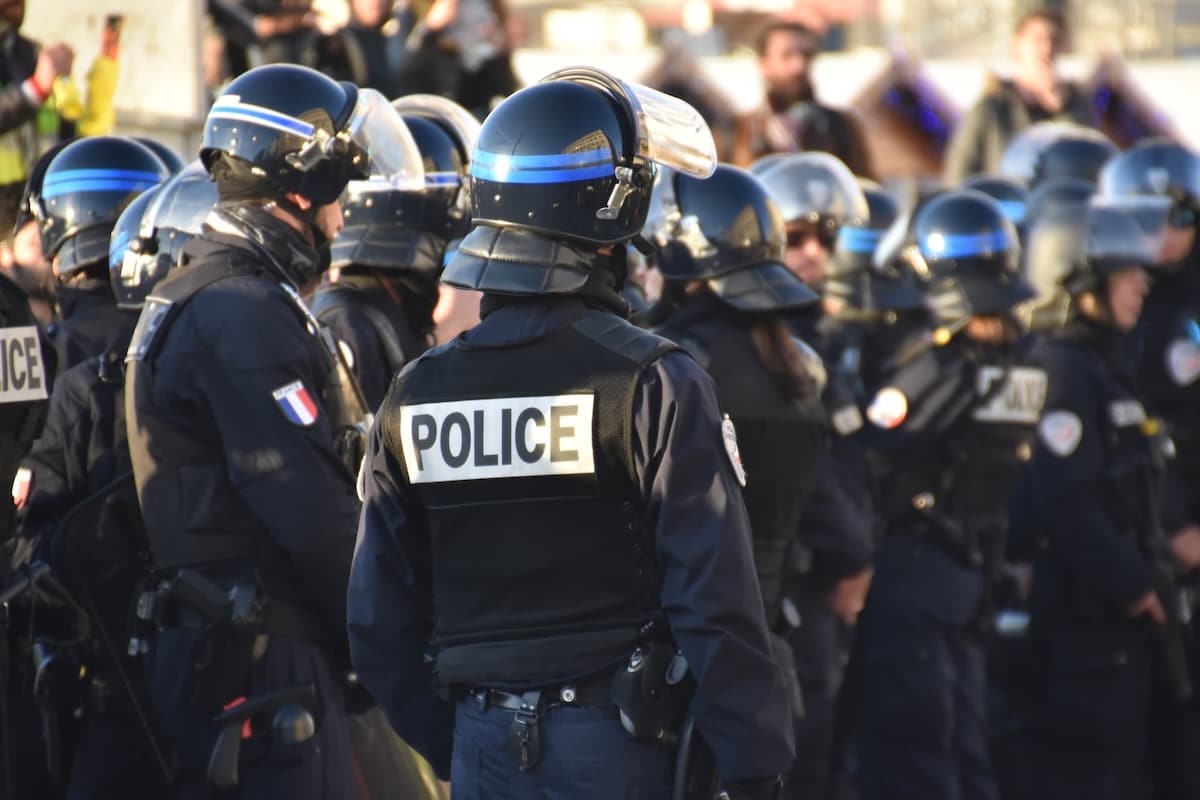Police Officers In Riot Gear Police Officers In Riot Gear