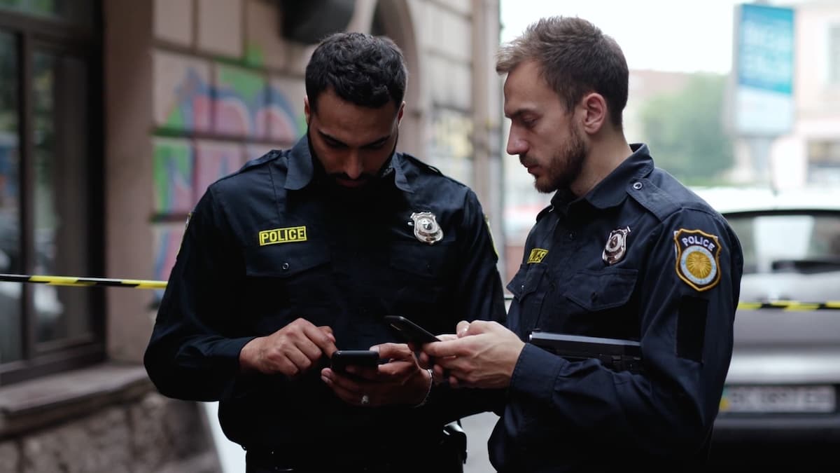 Police Officers On Phone Police Officers On Phone