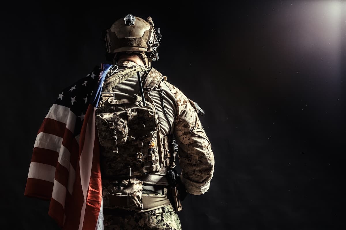 Soldier Holding Machine Gun With National Flag Soldier Holding Machine Gun With National Flag